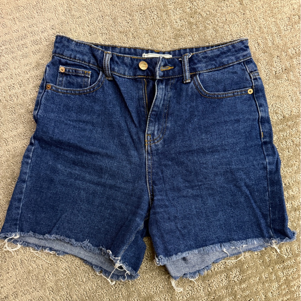 Blue High Rise Jeans with Distressed Hem